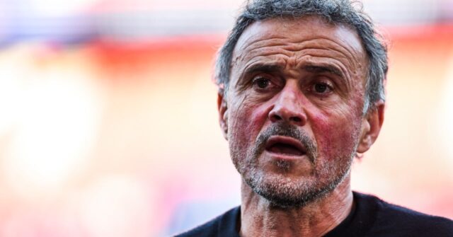 1777707763_Luis-Enrique-weighed-down-by-one-of-his-players.jpg