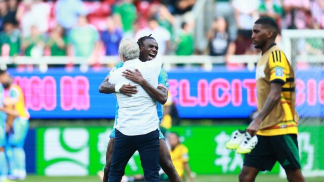 dr-congo-s-ngal-ayel-mukau-and-coach-sebastien-desabre-celebrate-qualifying-for-the-fifa-world-cup.J.jpeg