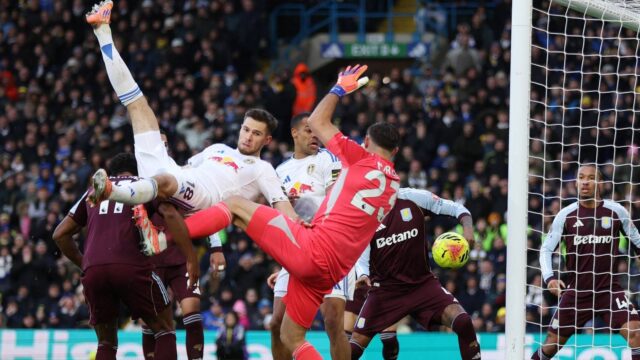leeds-united-s-anton-stach-in-action-with-aston-villa-s-emiliano-martinez-before-leeds-united-s-luka.jpeg