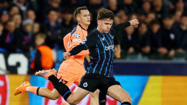 club-brugge-s-kyriani-sabbe-in-action-with-fc-barcelona-s-marc-casado.JPG