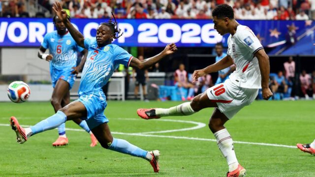 england-s-jude-bellingham-in-action-with-dr-congo-s-aaron-wan-bissaka.JPG