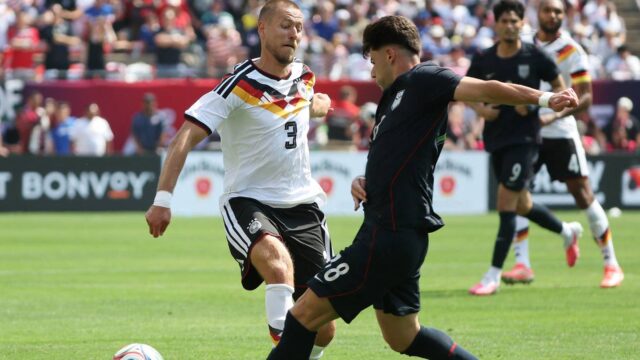germany-s-waldemar-anton-in-action-with-max-arfsten-of-the-u-s.JPG