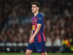 Contate o Barcelona FC Twente sobre Ruud Nijstad Pau Cubarsí wearing the FC Barcelona home kit during a match