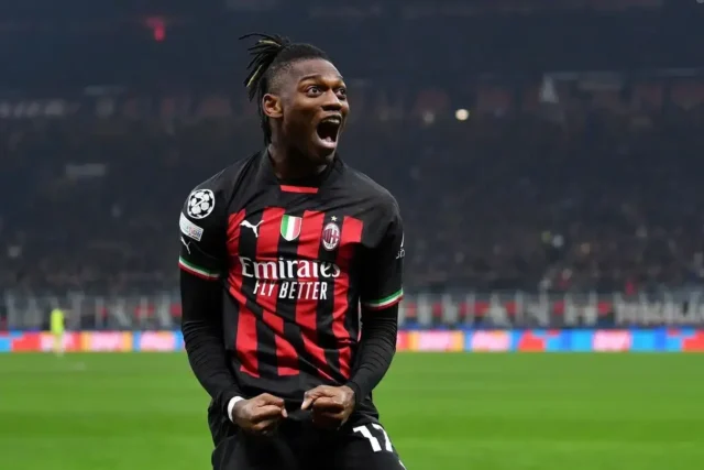 Jean-Matteo Bahoya Linked With Milan Move Rafael Leao in AC Milan home kit celebrating during a match