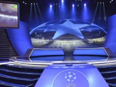 Confirmados rivais do Barcelona na Liga dos Campeões A high-tech blue stage set for the UEFA Champions League draw with large screens and the starball logo.